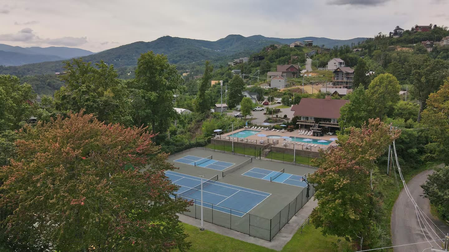 Aerial view of Chalet Village courts and pool